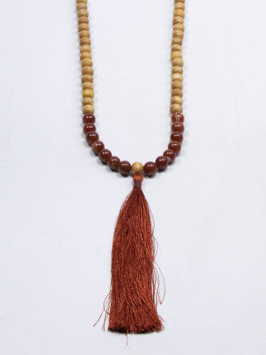Mala madera con mineral y fleco