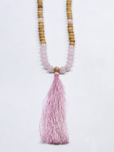 Mala madera con mineral y fleco