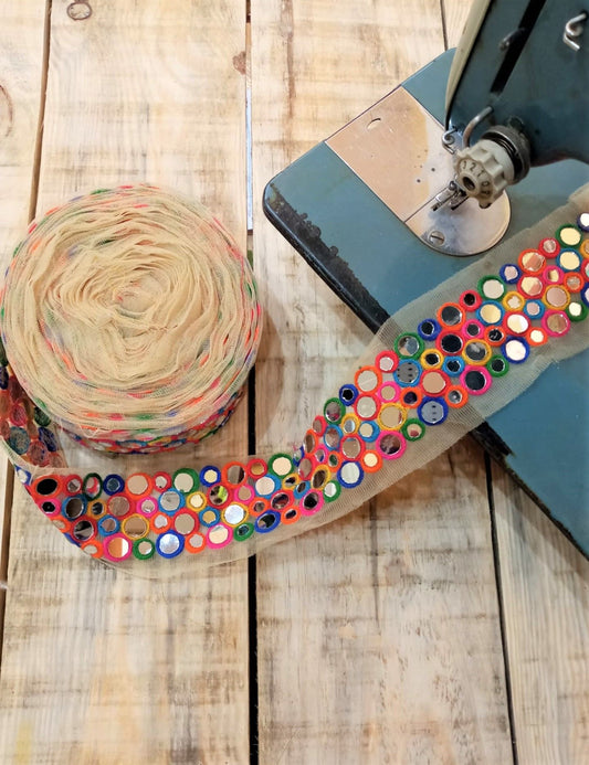 Pasamanería multicolor con espejo
