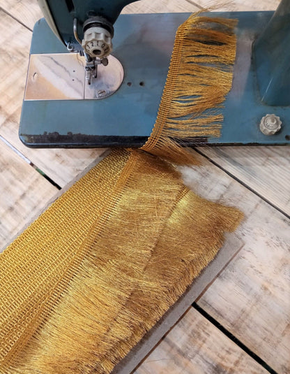 Pasamanería fleco dorado