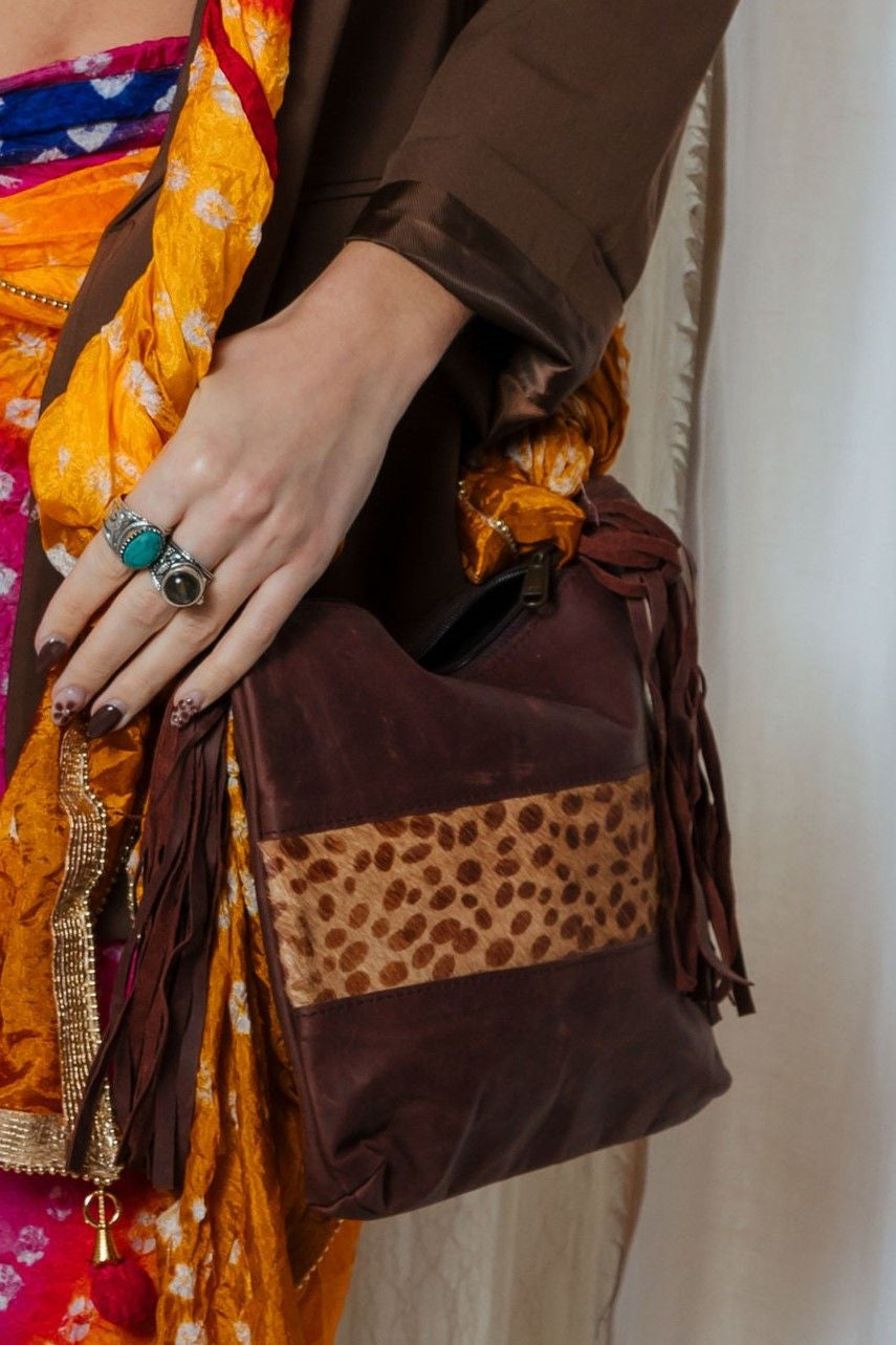 Bolso piel completo c/flecos