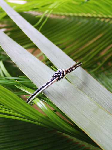 Brazalete con nudo plateado