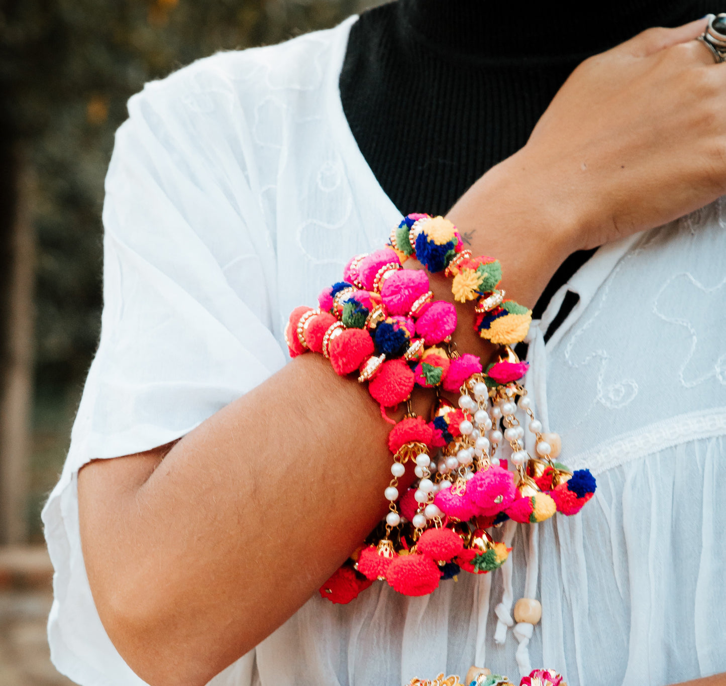 Pulsera Arati Holi pompon