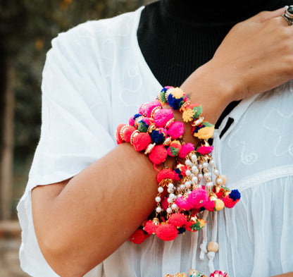 Pulsera Arati Holi pompon