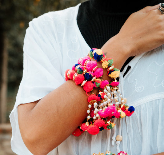 Pulsera Arati Holi pompon
