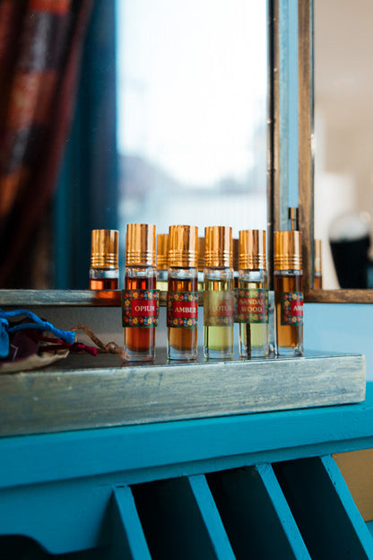 Perfume en esencia roll-on Opium