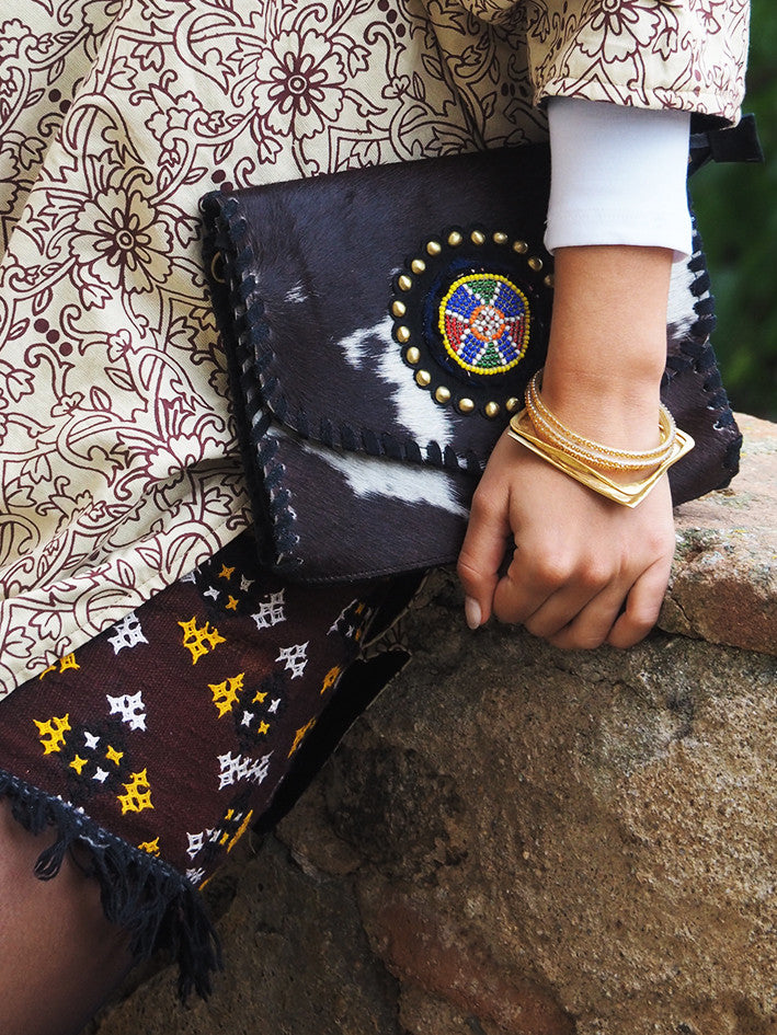 Brazalete fino dorado cuadrado